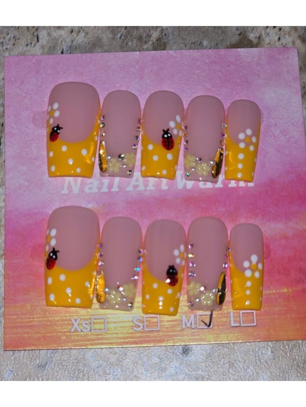 Size M Press-On Nails with Yellow and Pink Ladybug Design